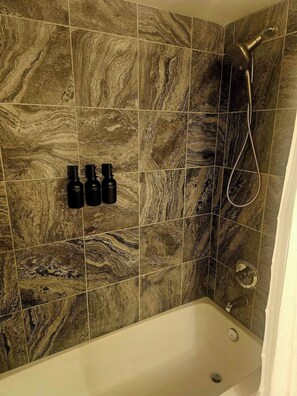 Shower, hair dryer, towels, soap