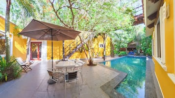 Outdoor pool, pool umbrellas, sun loungers