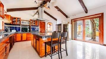 Superior Villa, Patio, Garden View | Private kitchen | Full-size fridge, microwave, oven, stovetop