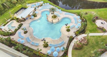 Luxury suites, 7 heated pools & minutes from Orlando’s world-famous parks
