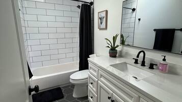 Hair dryer, towels, soap, shampoo