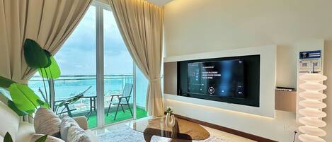 Design Apartment, 3 Bedrooms, Non Smoking, City View | Living area | Flat-screen TV