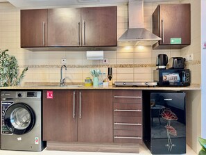 Departamento Deluxe, balcón, vista a la ciudad | Microondas