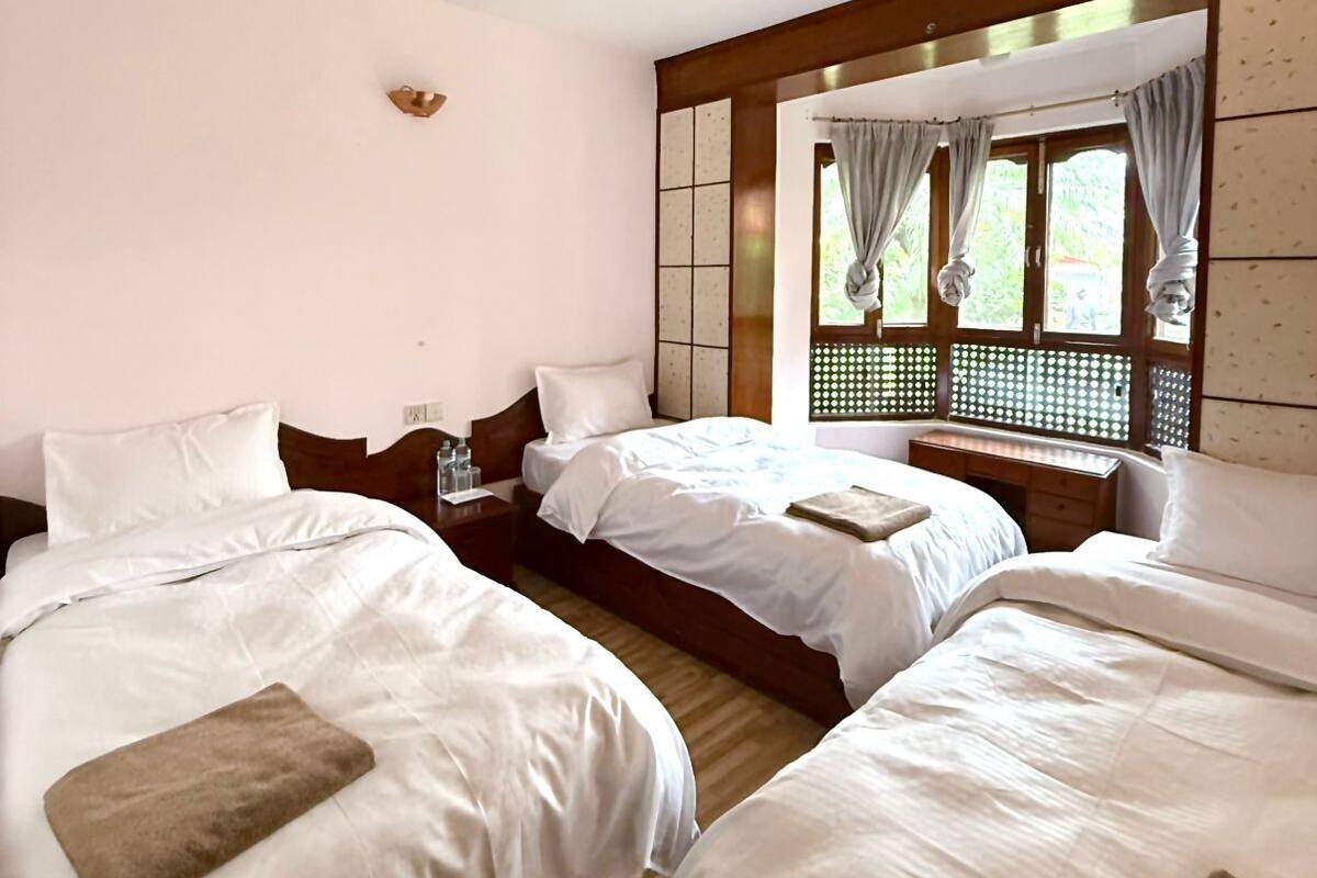 Economy Triple Room, Garden View | Free WiFi