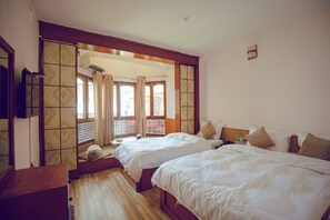 Deluxe kamer, 1 twee- of 2 eenpersoonsbedden, uitzicht op tuin | Gratis wifi, beddengoed