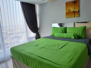 Quarto standard, vista para a cidade | Roupa de cama