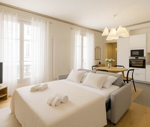 1 bedroom, desk, iron/ironing board, travel crib