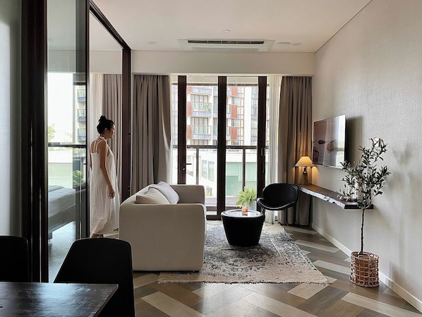 Apartamento superluxo, sacada, vista para a cidade | Área de estar
