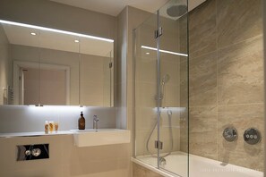 Shower, eco-friendly toiletries, hair dryer, towels
