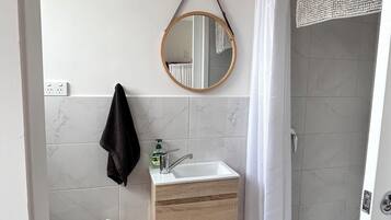 Hair dryer, towels, soap, toilet paper