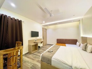 Premium bedding, desk, laptop workspace, soundproofing