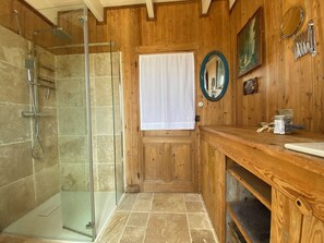 Shower, towels, soap, toilet paper