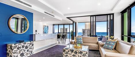 Luxury Apartment, Air conditioning, Ocean View | Living area | Flat-screen TV