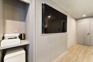 Desk, laptop workspace, blackout drapes, soundproofing