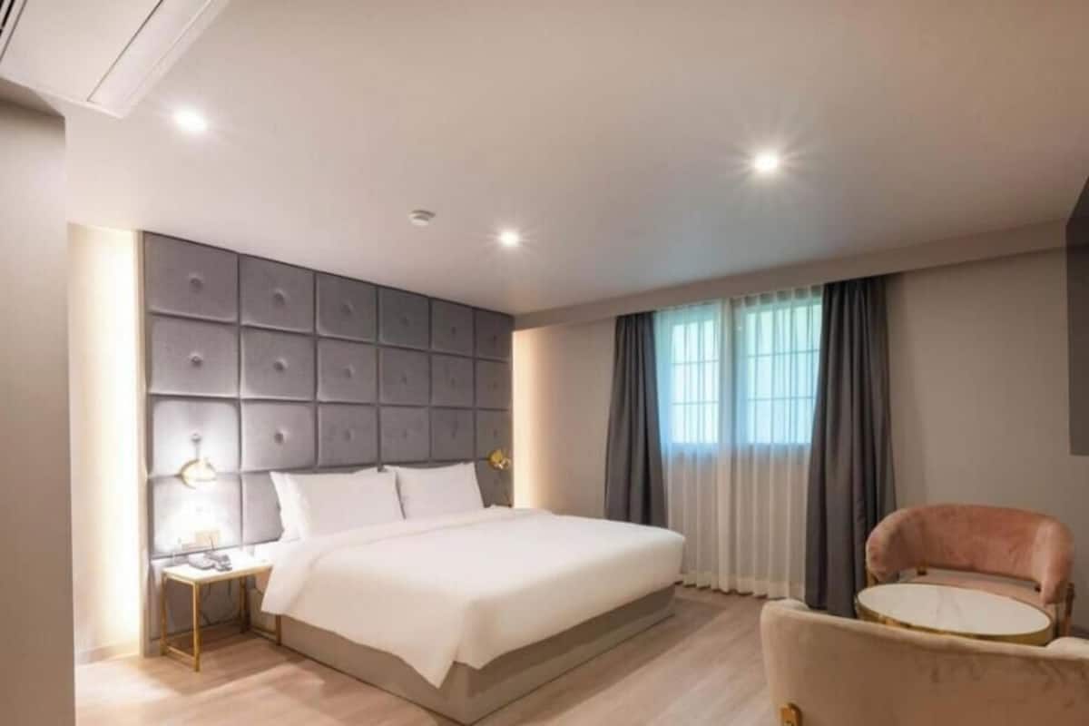 Chambre Deluxe | Bureau, espace de travail pour ordinateurs portables