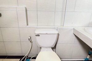 Ducha, bidet, toallas