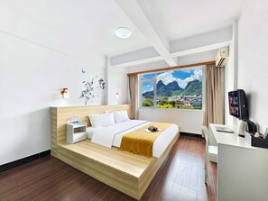 Economy Double Room, Mountain View | Desk, blackout drapes, soundproofing, free WiFi
