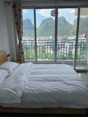 Basic Double Room, Hill View | Desk, blackout drapes, soundproofing, free WiFi