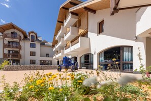A modern building with multiple balconies and large windows. - Delightful apartment in Saint Chaffrey (SAINT CHAFFREY)