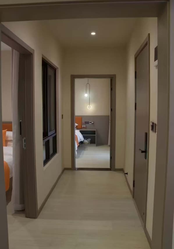 Family Suite, Partial Lake View | Living area | TV