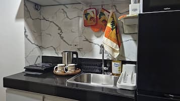 Fridge, microwave, cookware/dishes/utensils
