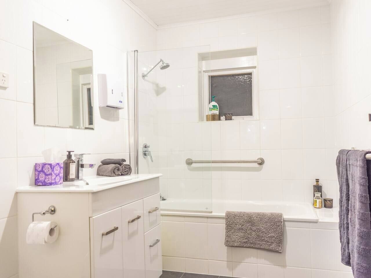 Shower, hair dryer, towels