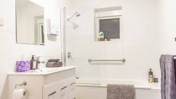 Shower, hair dryer, towels
