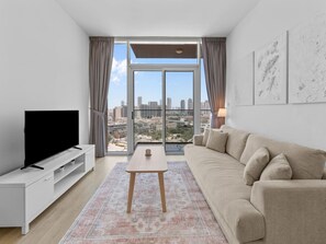 TV - Bright 1 Bedroom Apartment with JVC open view (Dubai)
