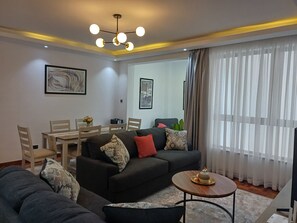 Comfort Apartment, Mobility Accessible, Private Bathroom | Living area - Mi casa by Edmor Suites. (Nairobi)