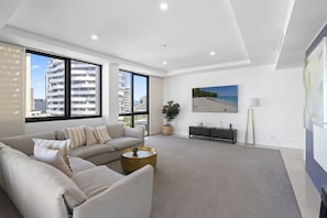 Appartement Deluxe, vue océan, en bord de plage | Coin séjour