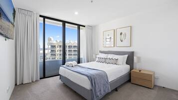 Deluxe Apartment, Ocean View, Beachside | Iron/ironing board, free WiFi