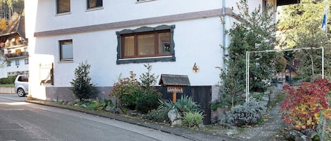A two-story building with a sign reading 'Waldblick.'