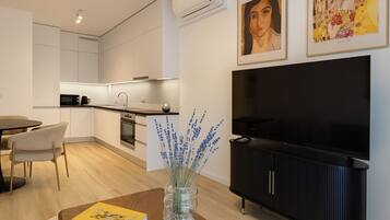 Deluxe Apartment, 1 Bedroom, City View | Private kitchen | Full-size fridge, microwave, oven, stovetop