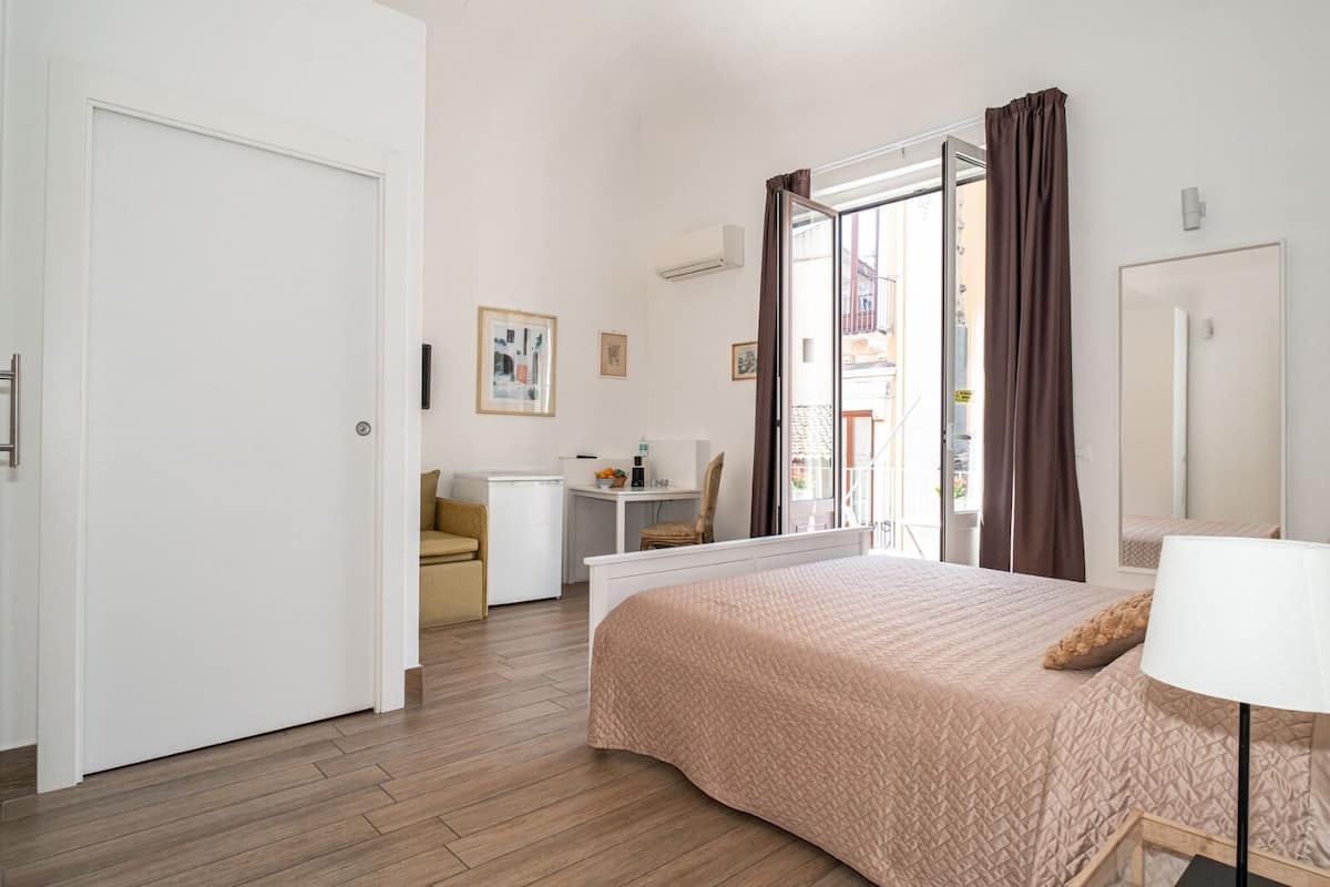 Superior Triple Room, City View | Desk, laptop workspace, blackout drapes, soundproofing
