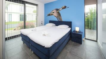 2 slaapkamers, een strijkplank/strijkijzer, beddengoed