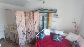 1 habitación y ropa de cama