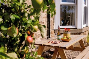 Outdoor dining - Barley Bank, a peaceful, tranquil dog-friendly retreat with a wood burning stove (Duffus)