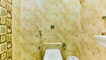 Shower, free toiletries, towels, soap