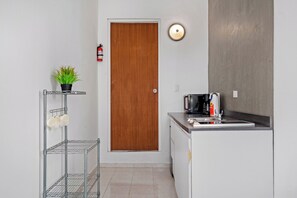 Fridge, microwave, stovetop, coffee/tea maker