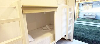 Single capsule in room of 16 capsules