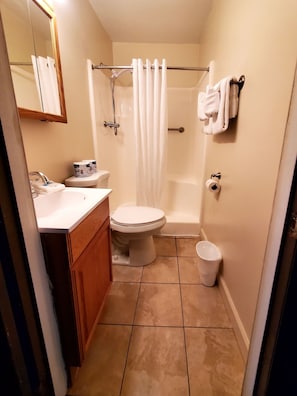 Signature Chalet, 3 Bedrooms, Patio, Mountainside | Bathroom | Combined shower/tub, free toiletries, towels, soap