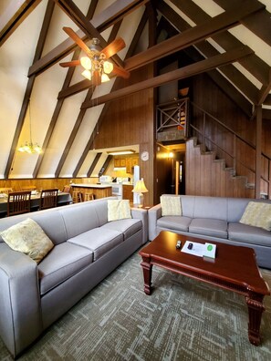 Signature Chalet, 3 Bedrooms, Patio, Mountainside | Living room | 32-inch Smart TV with cable channels, fireplace