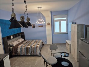 1 habitación, tabla de planchar con plancha, wifi y ropa de cama 