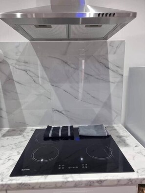 Fridge, coffee/tea maker, cookware/dishes/utensils