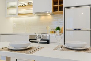Căn hộ Deluxe, quang cảnh thành phố | Phòng ăn