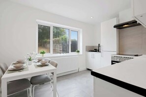Fridge, stovetop, cookware/dishes/utensils