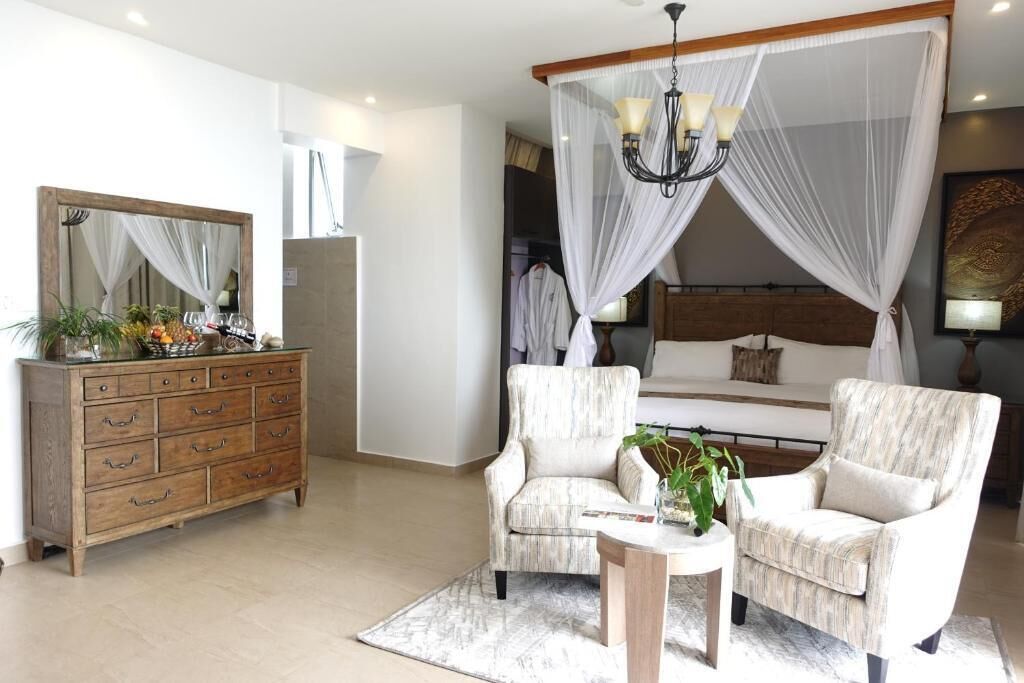 Suite ejecutiva, balcón, vistas a la ciudad | Caja fuerte, sistema de insonorización, wifi gratis y ropa de cama