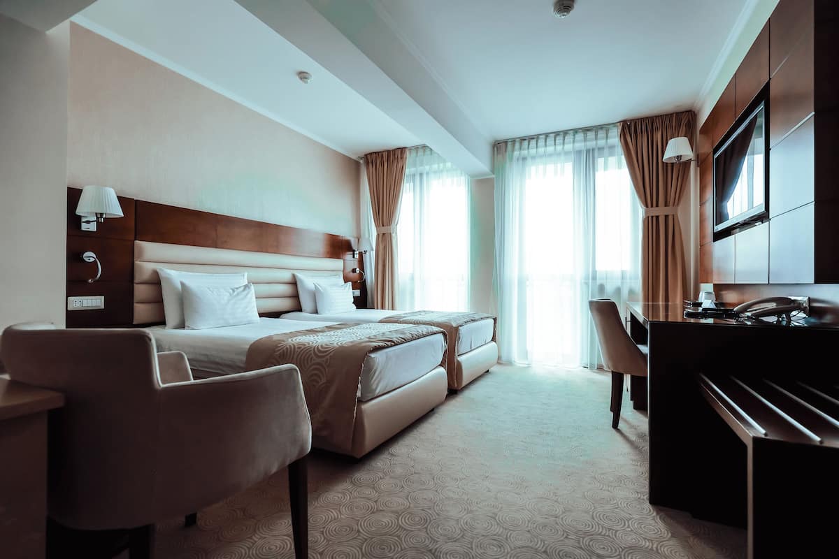 Twin Room, Balcony | In-room safe, iron/ironing board, free WiFi