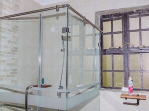 Family Bungalow, Garden View | Bathroom | Shower, free toiletries, slippers, towels - Lux Suites Enkarsis Bungalow Kisaju (Kitengela)