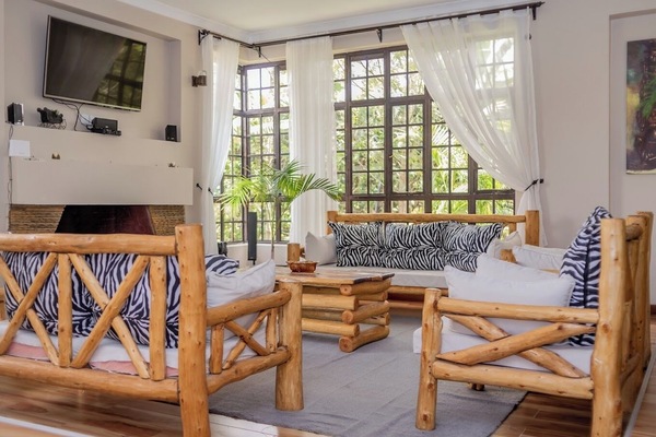 Family Bungalow, Garden View | Living area | 32-inch Smart TV with digital channels